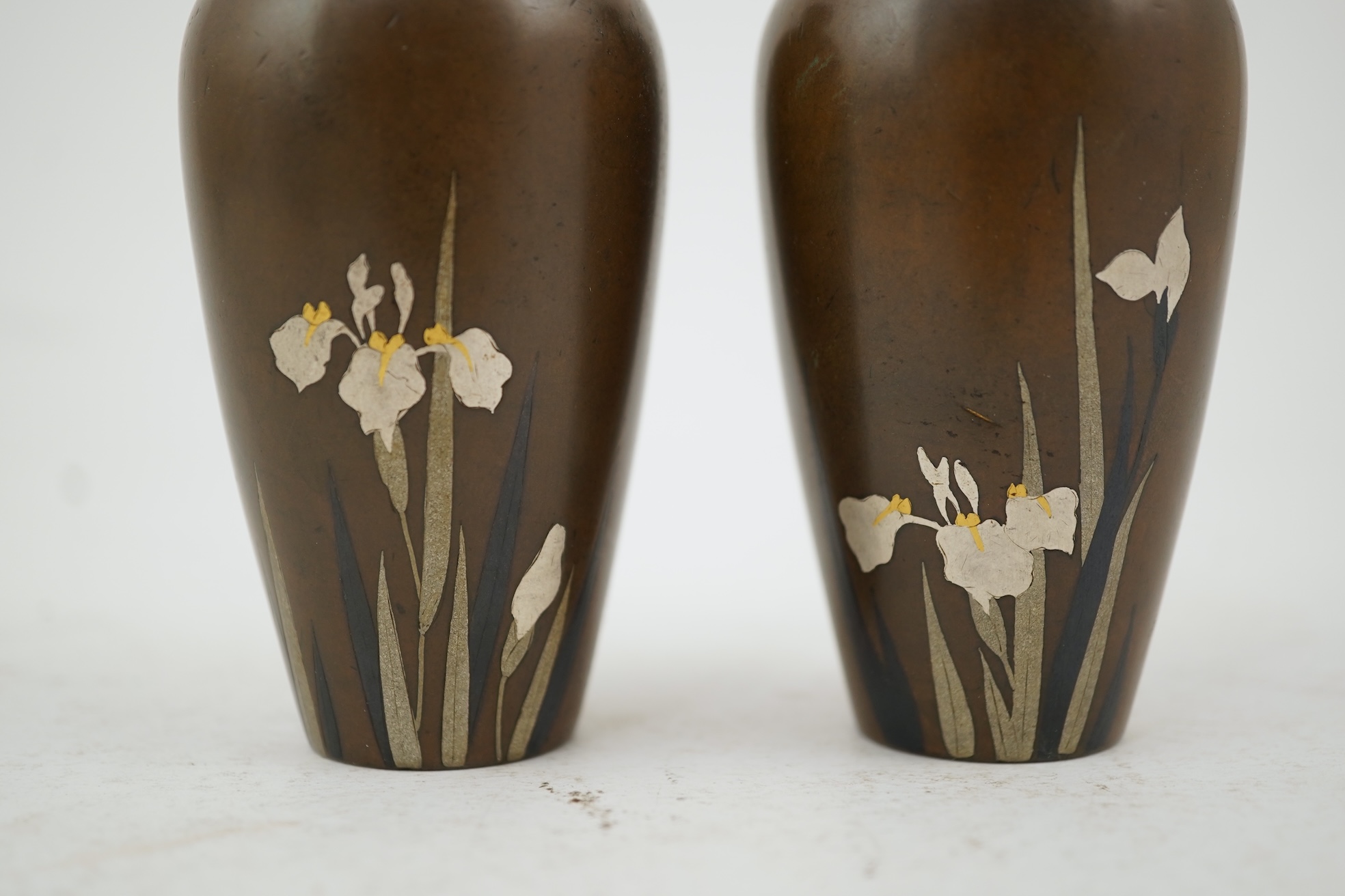 A pair of Japanese bronze and mixed metal miniature vases, by Noboru Nogawa, Meiji period